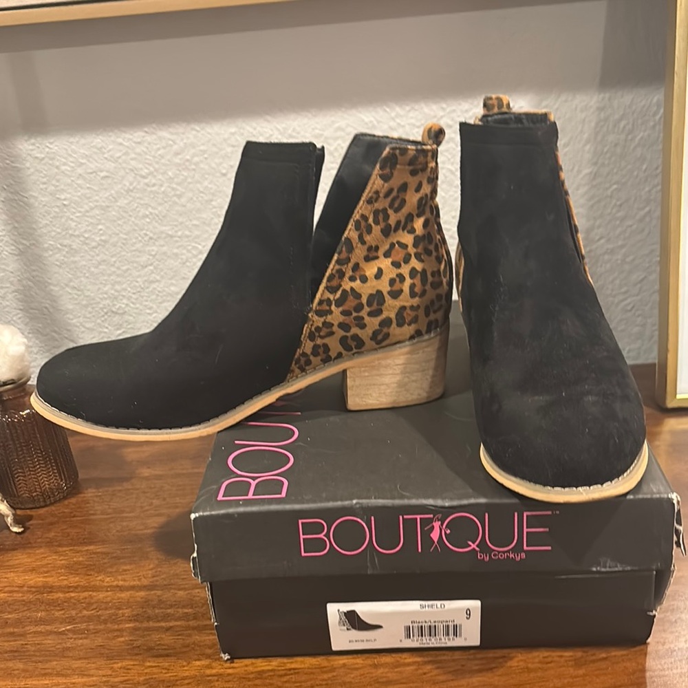 Corkys Black and Brown Ankle Booties with Sleek Design